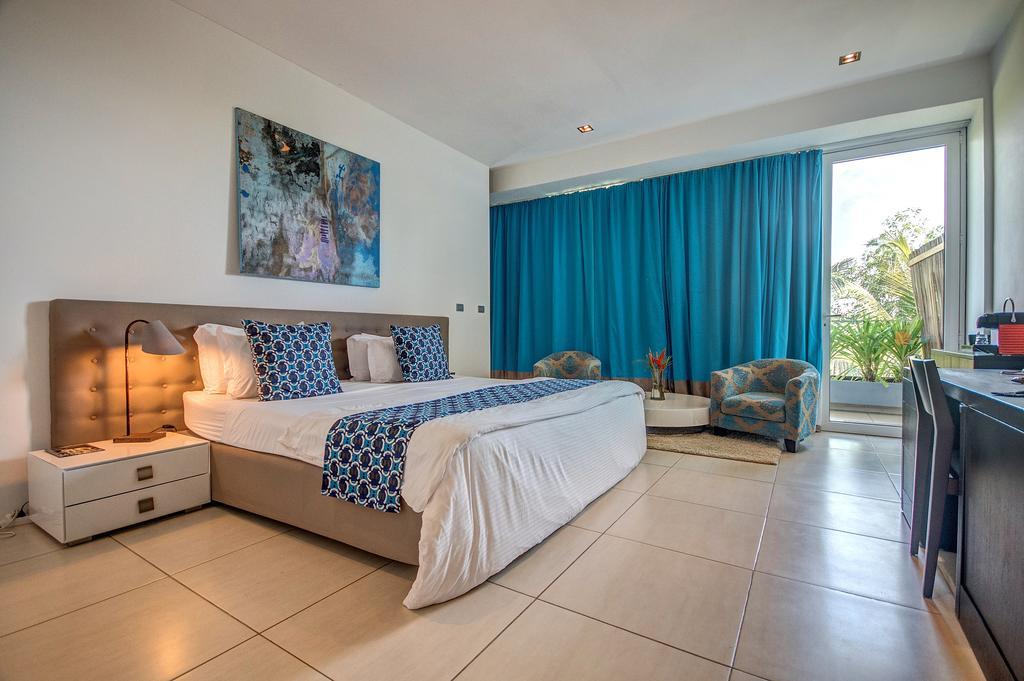 Hotel Maison Rouge Котону Экстерьер фото