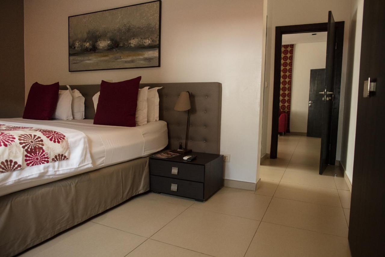 Hotel Maison Rouge Котону Экстерьер фото
